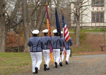 Norwich Color Guard in flag raising ceremony for VLGS's 2024 Veterans Day program.