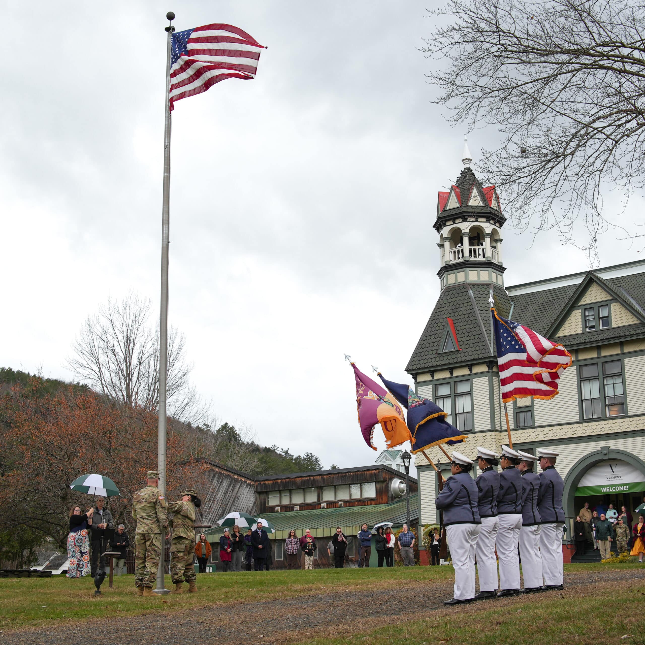 Vermont National Guard and Color Guard raise the flag.