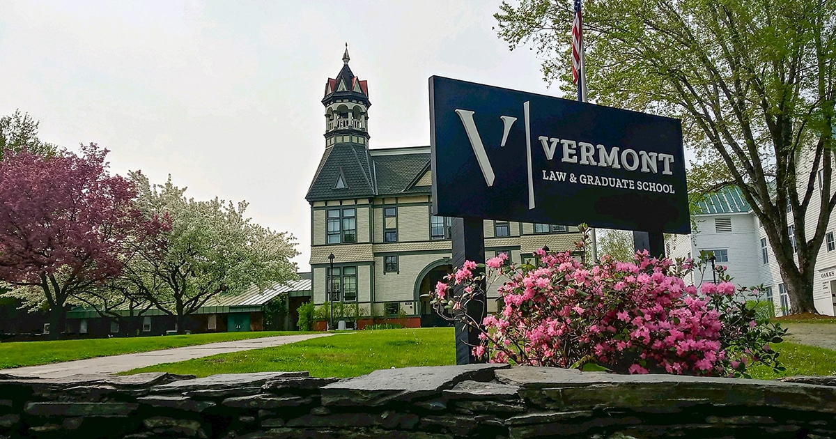 Vermont Law and Graduate School sign in front of Debevoise Hall.