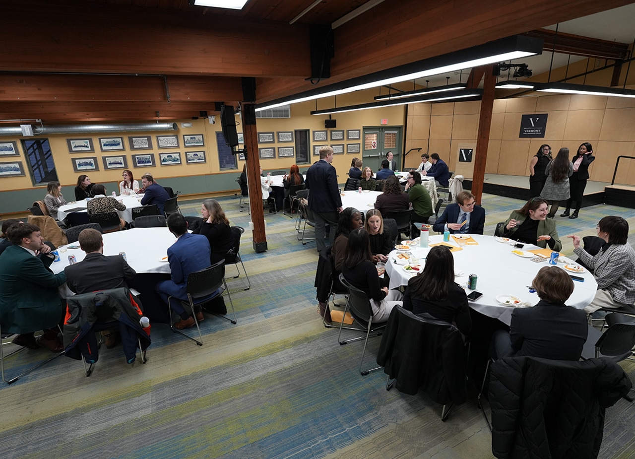 Students and interviewers attend a cocktail hour after their one-on-one sessions.